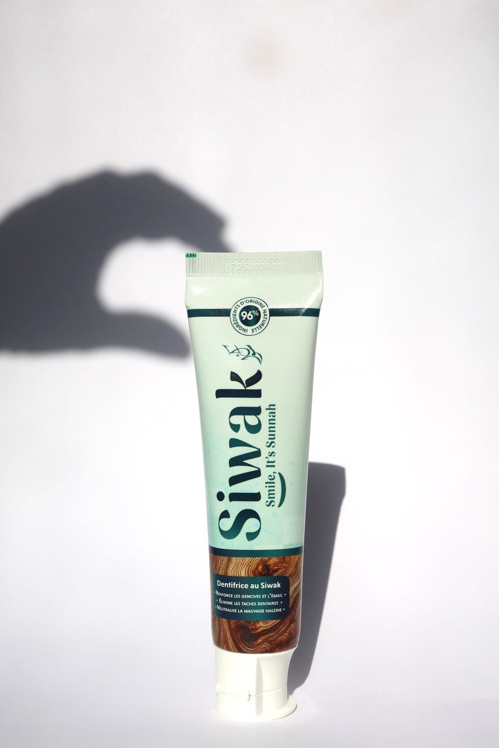 Dentifrice Siwak naturel 75ml sur fond blanc minimaliste - Produit hygiène bucco-dentaire halal et bio