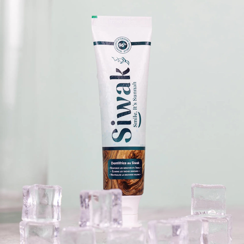 Tube dentifrice Siwak naturel sur fond frais - Formule renforce gencives et élimine taches dentaires
